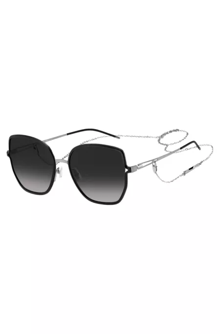 Black-frame sunglasses with forked temples and branded chain