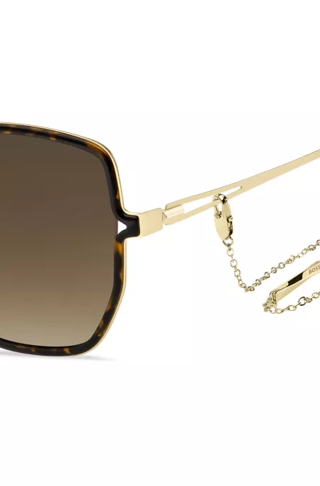 Havana-frame sunglasses with forked temples and branded chain
