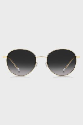 Round-frame sunglasses in lightweight titanium, Gold