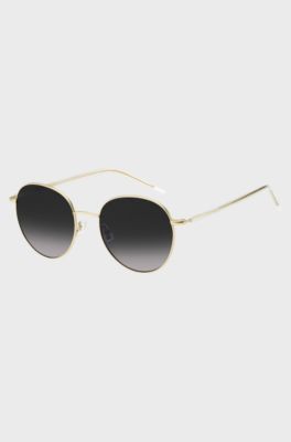 Round-frame sunglasses in lightweight titanium, Gold