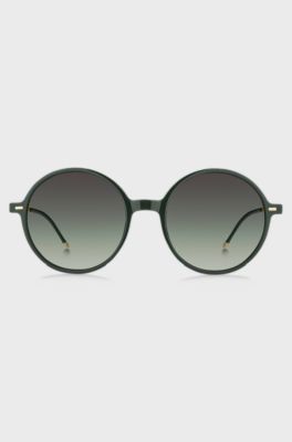 Round-frame sunglasses in green acetate with branded chain, Green