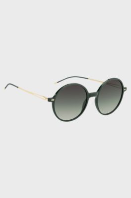 Round-frame sunglasses in green acetate with branded chain, Green