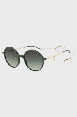 Round-frame sunglasses in green acetate with branded chain, Green