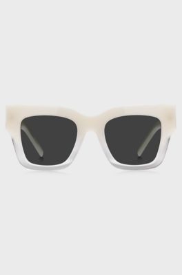 Gafas de sol de acetato en tono opalino con herrajes de la marca, Rosa claro
