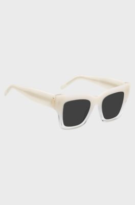 Gafas de sol de acetato en tono opalino con herrajes de la marca, Rosa claro
