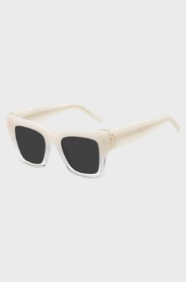 Lunettes de soleil en ac&eacute;tate opale avec garnitures en m&eacute;tal embl&eacute;matiques, Rose clair