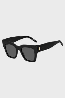 Black-acetate sunglasses with signature hardware, Black