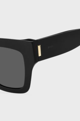 Black-acetate sunglasses with signature hardware, Black