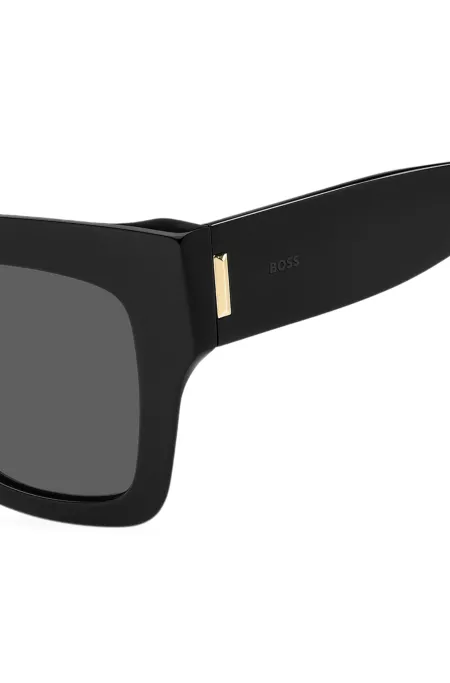 Black-acetate sunglasses with signature hardware