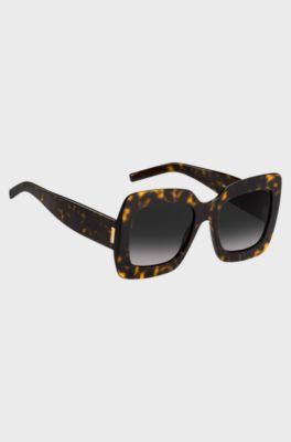 Lunettes de soleil en ac&eacute;tate Havana avec garnitures en m&eacute;tal embl&eacute;matiques, Noir &agrave; motif