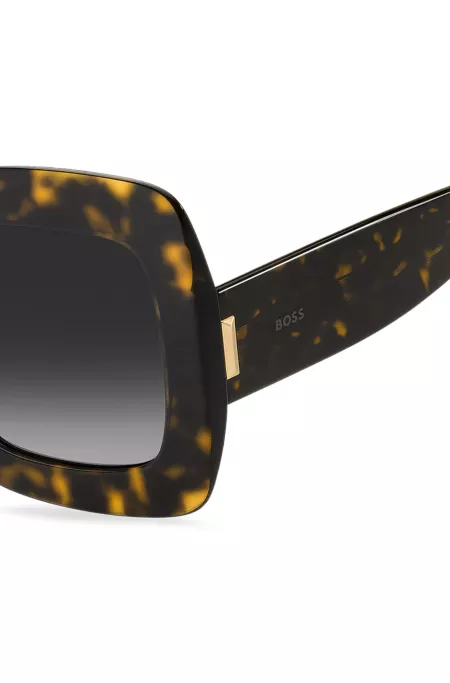 Havana-acetate sunglasses with signature hardware