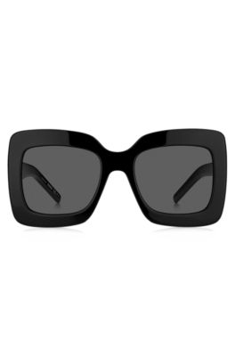 Black-acetate sunglasses with signature hardware, Black