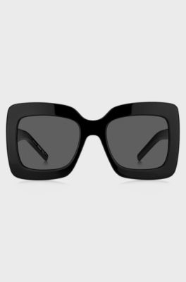 Black-acetate sunglasses with signature hardware, Black