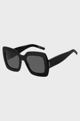 Black-acetate sunglasses with signature hardware, Black