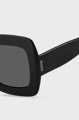 Black-acetate sunglasses with signature hardware, Black