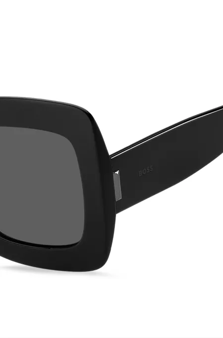 Black-acetate sunglasses with signature hardware