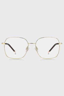 Gold-tone optical frames with Havana-acetate end tips, Gold