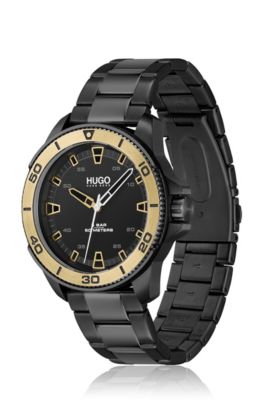 Black-plated watch with gold-toned bezel, Black
