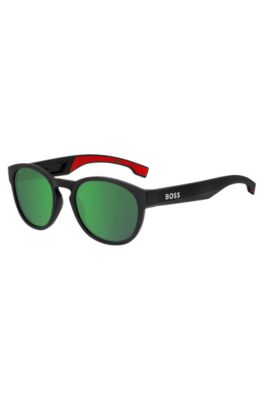 Black-acetate sunglasses with red rubberised inner temples, Black