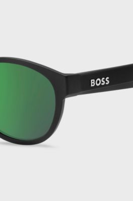 Black-acetate sunglasses with red rubberised inner temples, Black