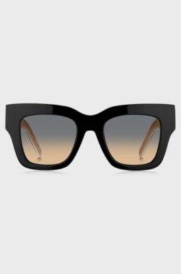 Black bio-acetate sunglasses with signature hardware, Black