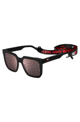 Udlevering næve Migration HUGO - Solbriller i sort acetat med linser med stablede logoer