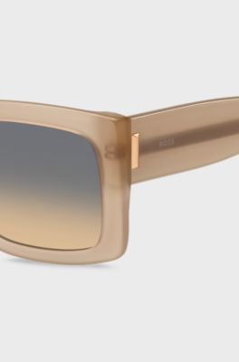 Sonnenbrille aus opalfarbenem Bio-Acetat mit charakteristischen Metalldetails, Beige