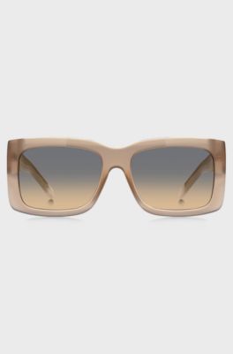 Sonnenbrille aus opalfarbenem Bio-Acetat mit charakteristischen Metalldetails, Beige
