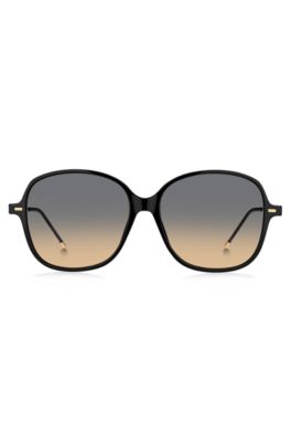 Black-acetate sunglasses with gold temples and chain strap, Black