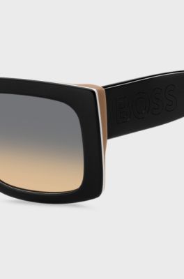 Signature-stripe bio-acetate sunglasses with large temple logo, Black