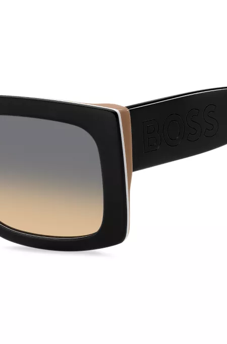 Signature-stripe bio-acetate sunglasses with large temple logo
