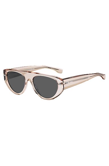 Translucent pink bio-acetate sunglasses with patterned rivets, light pink