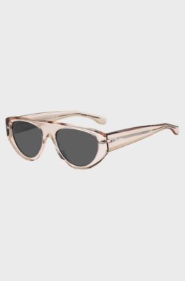 Lunettes de soleil rose translucide en bio-ac&eacute;tate avec rivets &agrave; motif, Rose clair