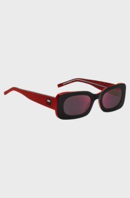 Red-and-black-acetate sunglasses with detachable slogan strap, Red