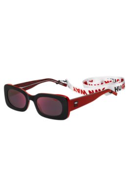 Red-and-black-acetate sunglasses with detachable slogan strap, Red
