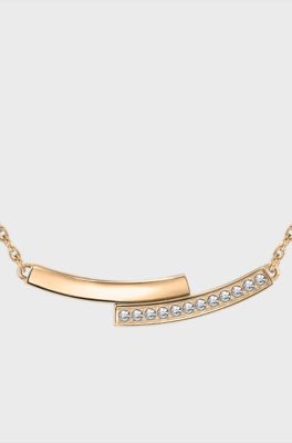 Gold-tone necklace with crystal-studded bar pendant, Gold tone