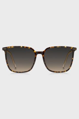 Horn-acetate sunglasses with lasered branding, Brown