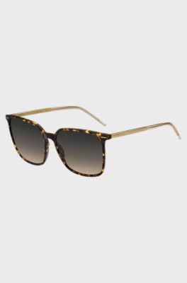 Sonnenbrille aus Acetat in Horn-Optik mit gelasertem Logo, Braun