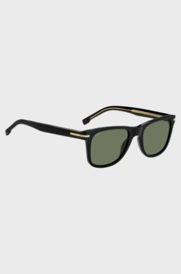 Black-acetate sunglasses with signature gold-tone detail, Black