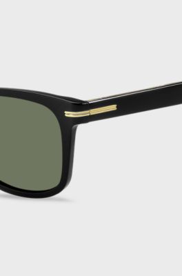 Black-acetate sunglasses with signature gold-tone detail, Black