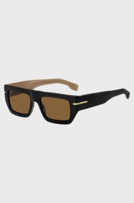 Black-acetate sunglasses with signature gold-tone detail, Black