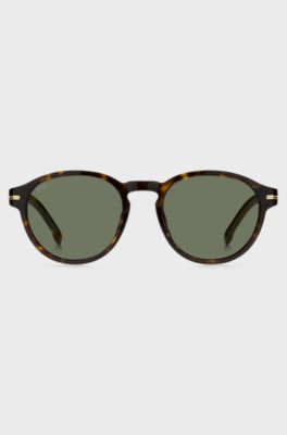 Horn-acetate sunglasses with signature gold-tone detail, Brown Patterned