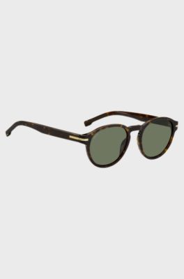 Horn-acetate sunglasses with signature gold-tone detail, Brown Patterned