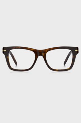 Brillenfassung aus Acetat in Horn-Optik mit charakteristischen goldfarbenen Akzenten, Braun