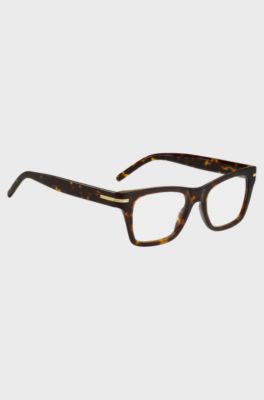 Brillenfassung aus Acetat in Horn-Optik mit charakteristischen goldfarbenen Akzenten, Braun