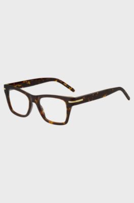 Brillenfassung aus Acetat in Horn-Optik mit charakteristischen goldfarbenen Akzenten, Braun