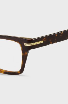 Brillenfassung aus Acetat in Horn-Optik mit charakteristischen goldfarbenen Akzenten, Braun