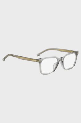 Clear-acetate optical frames with signature gold-tone detail, Transparent