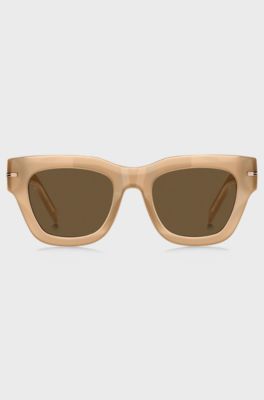 Beige acetatsolbriller med guldfarvet signaturdetalje, Beige