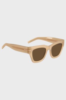 Lunettes de soleil en ac&eacute;tate beige avec d&eacute;tail dor&eacute; embl&eacute;matique, Beige